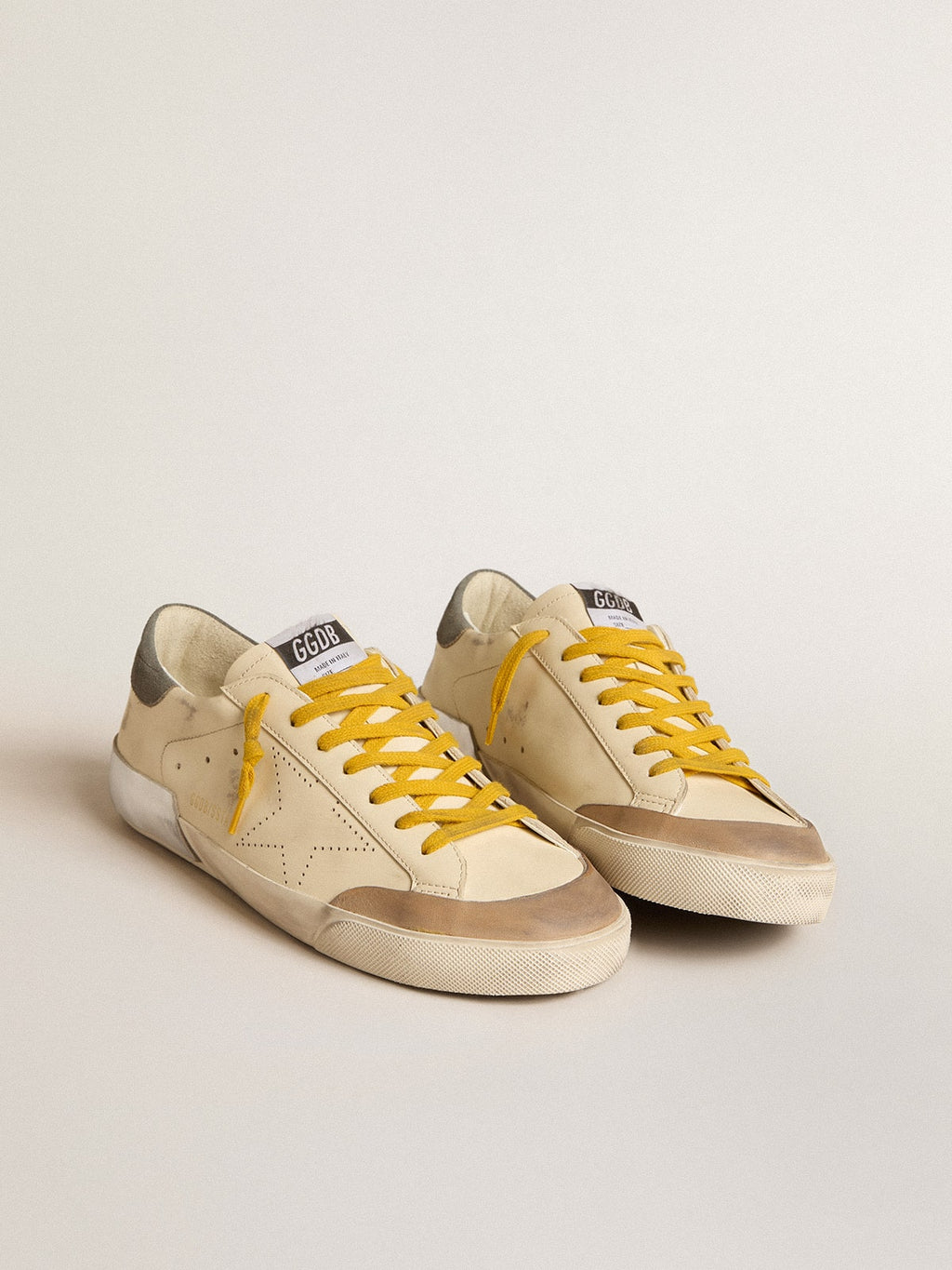 Super-Star in leather with perforated star and gray suede heel tab| Golden Goose