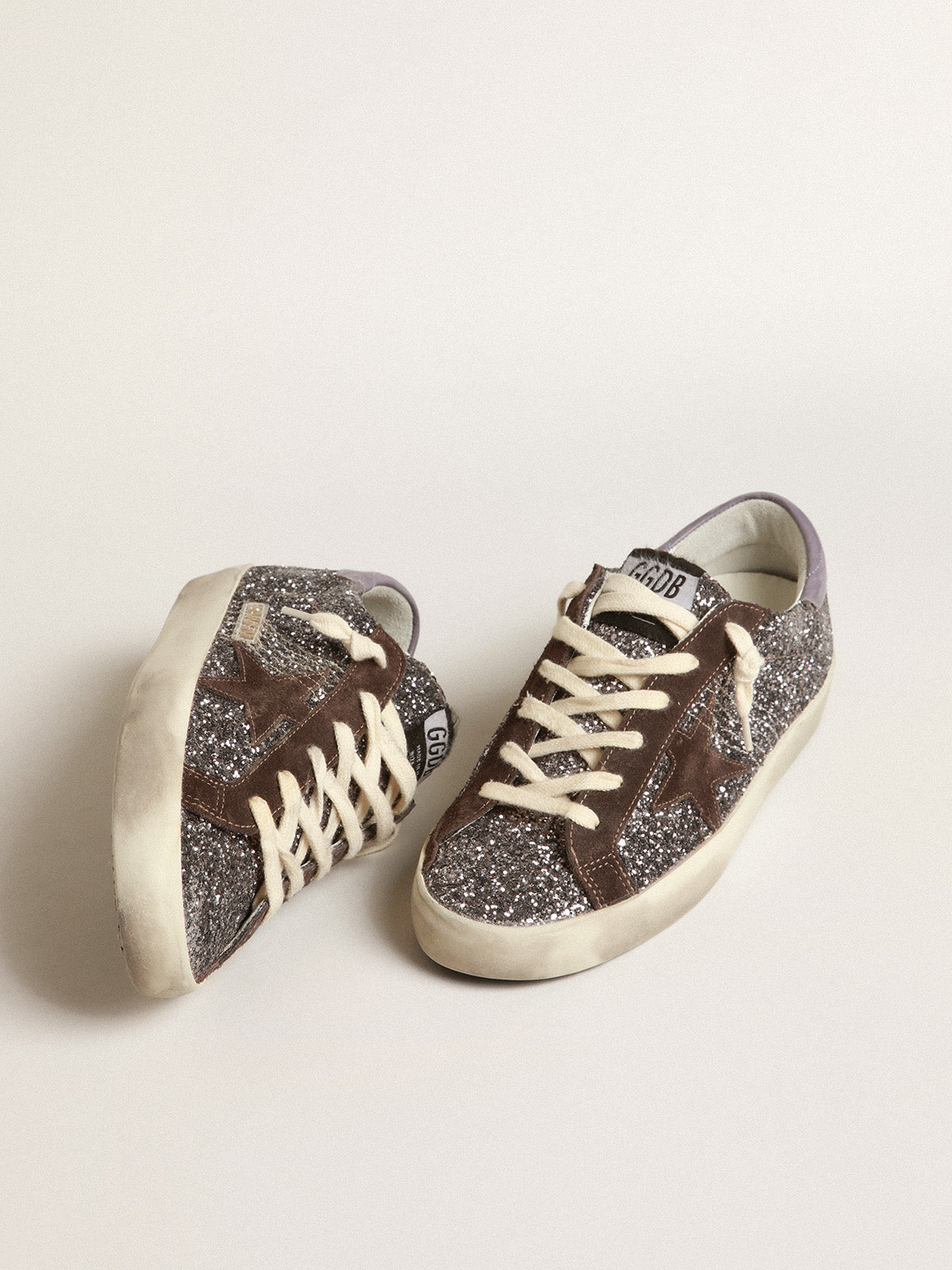 Super-Star in glitter with a brown star and lilac heel tab| Golden Goose