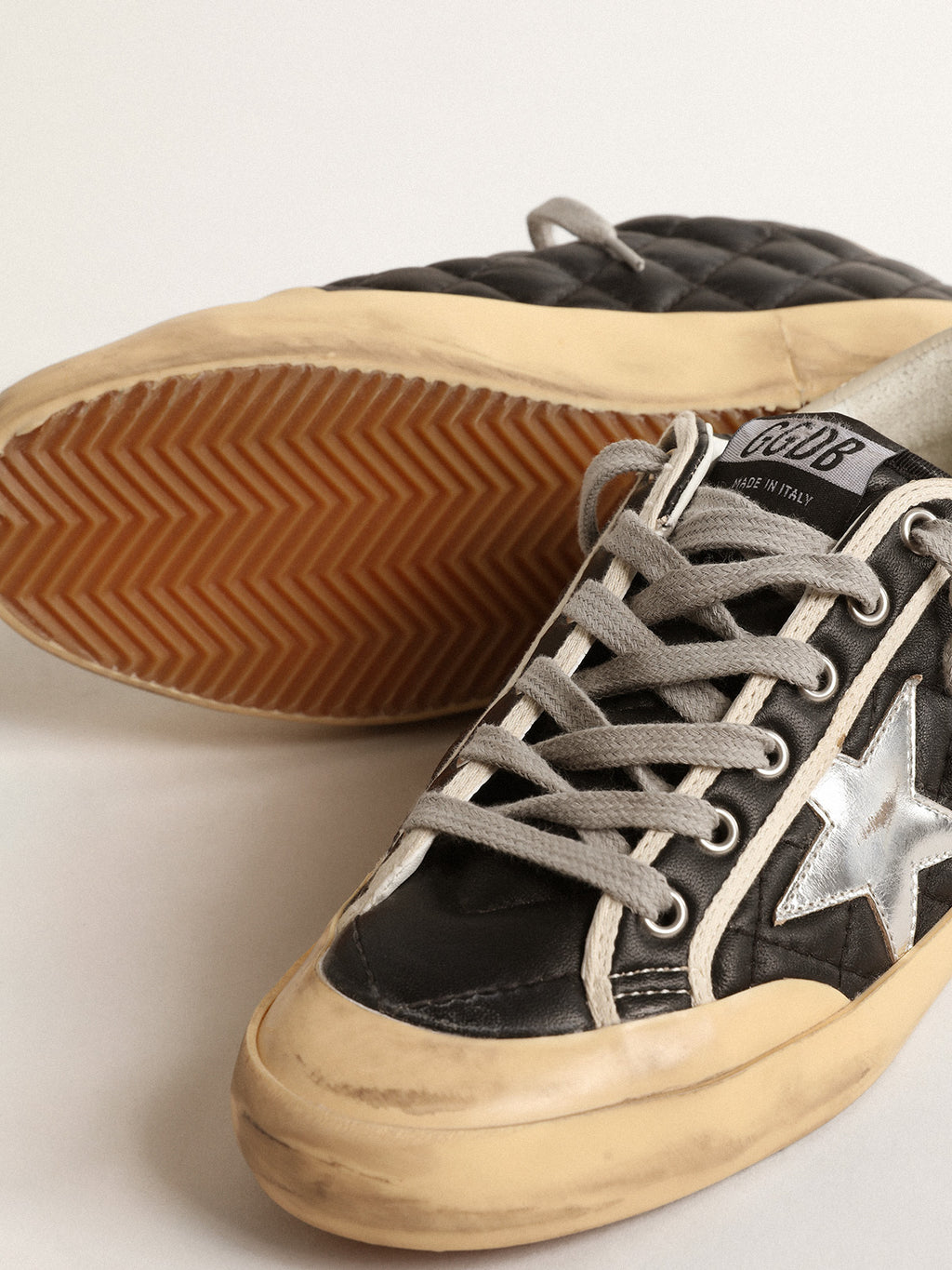 Super-Star Penstar in black matelassé nappa with silver star| Golden Goose