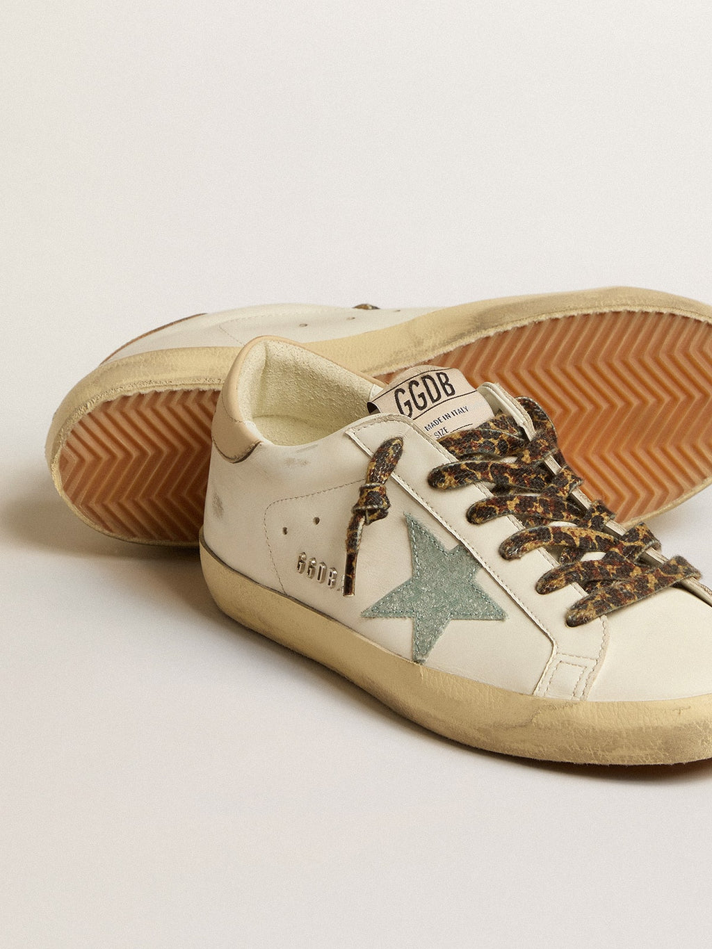 Women's Super-Star with gray glitter star and nude leather heel tab| Golden Goose