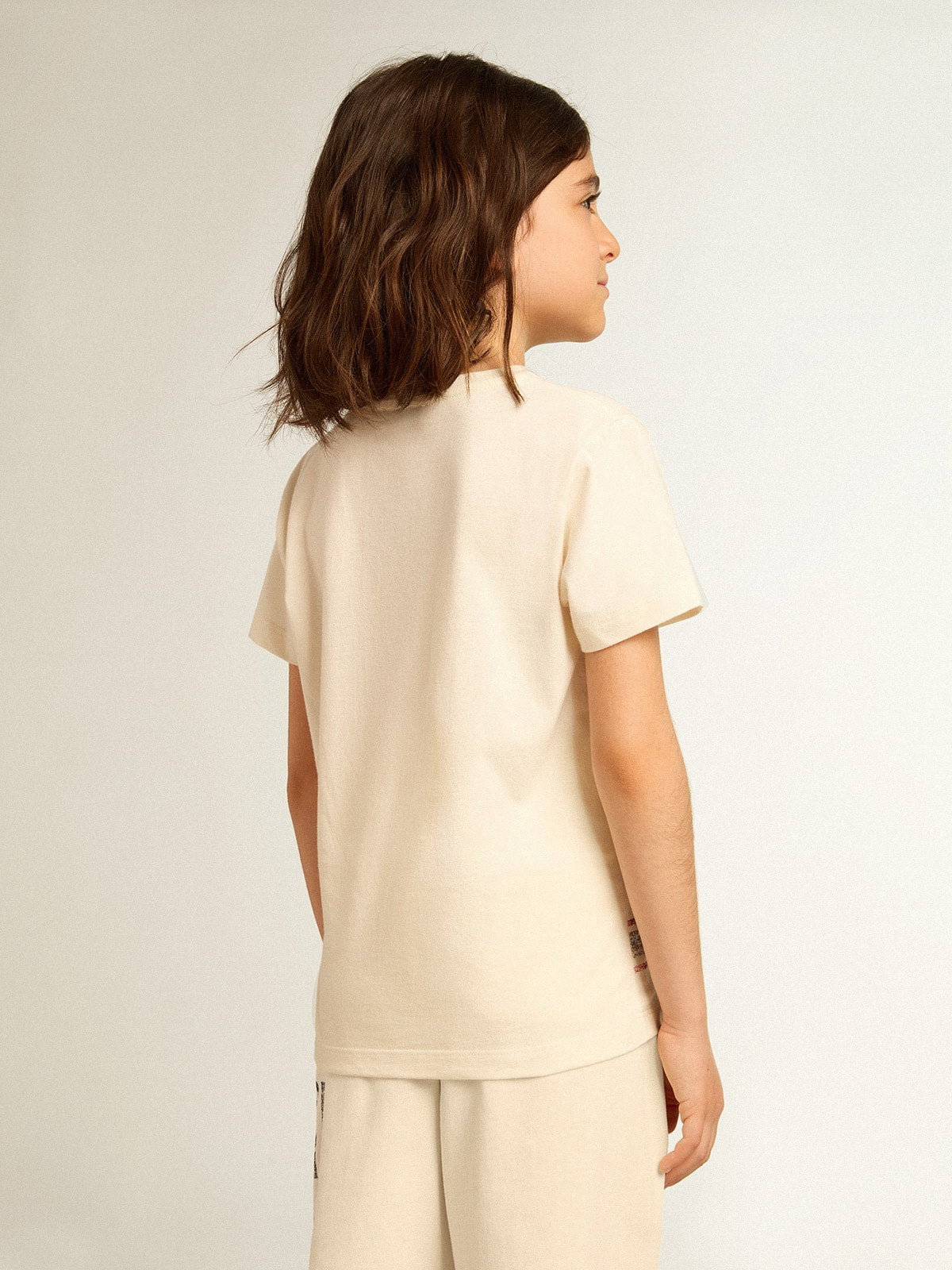 Cotton T-shirt in aged white with faded print at the center| Golden Goose