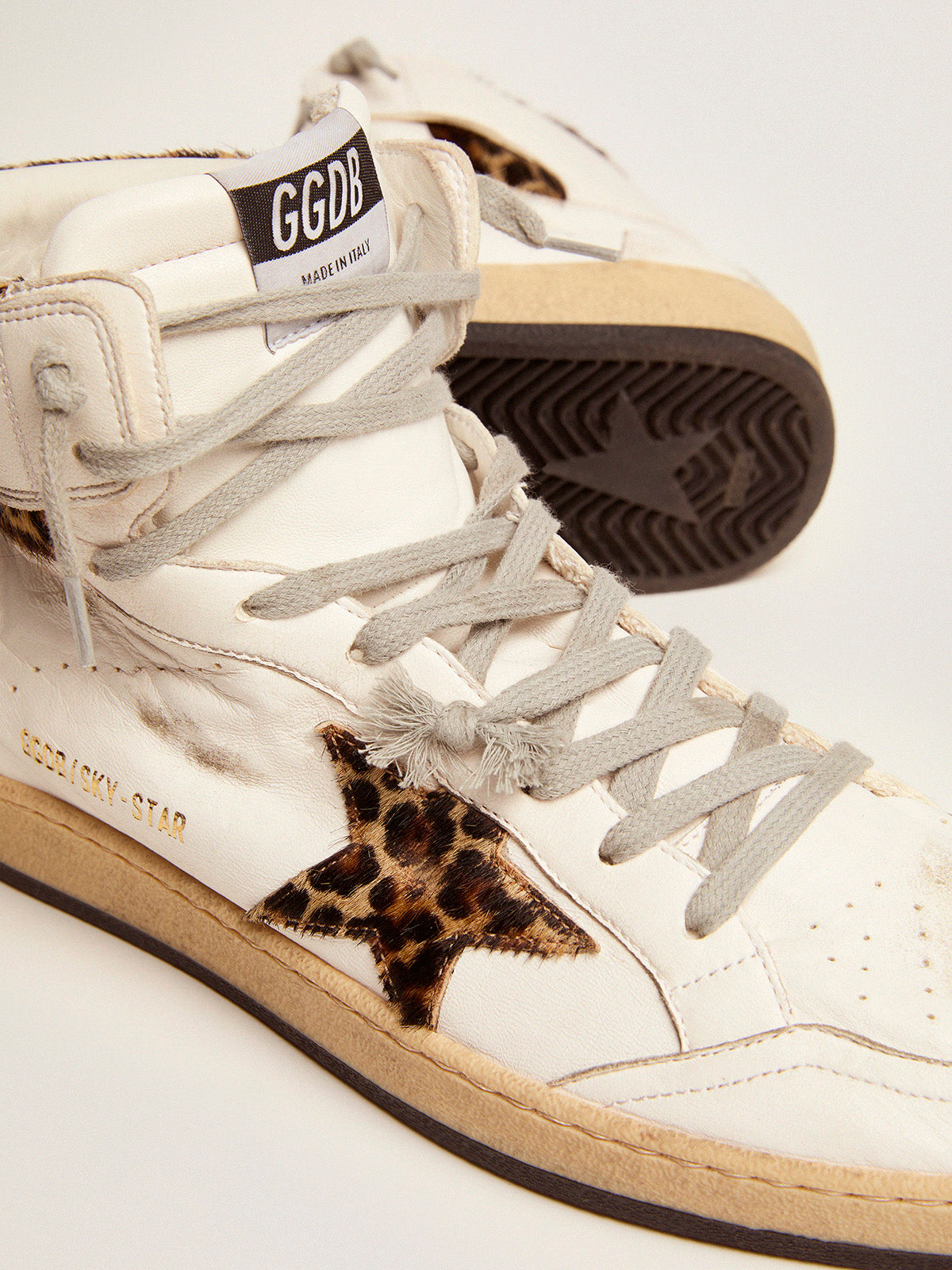 Sky-Star sneakers with signature on the ankle and leopard-print pony skin inserts| Golden Goose