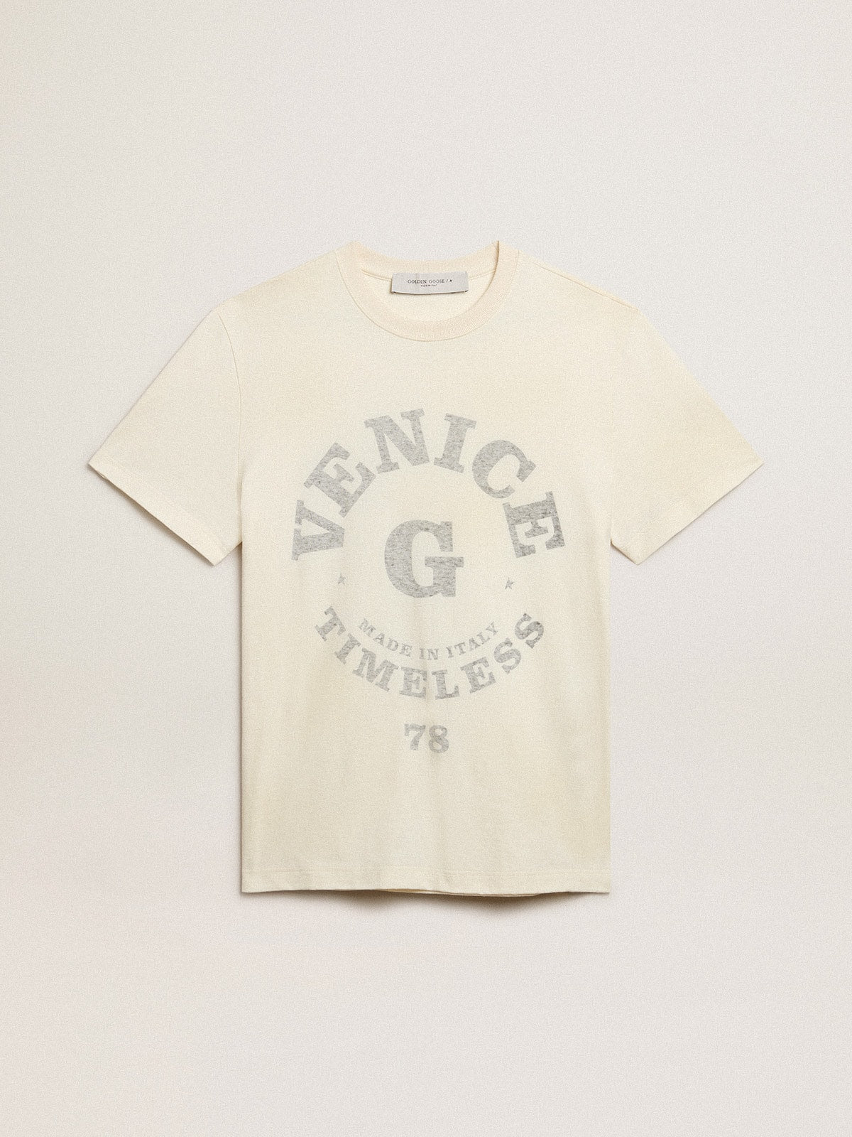 Men's cotton T-shirt in aged white with faded lettering| Golden Goose