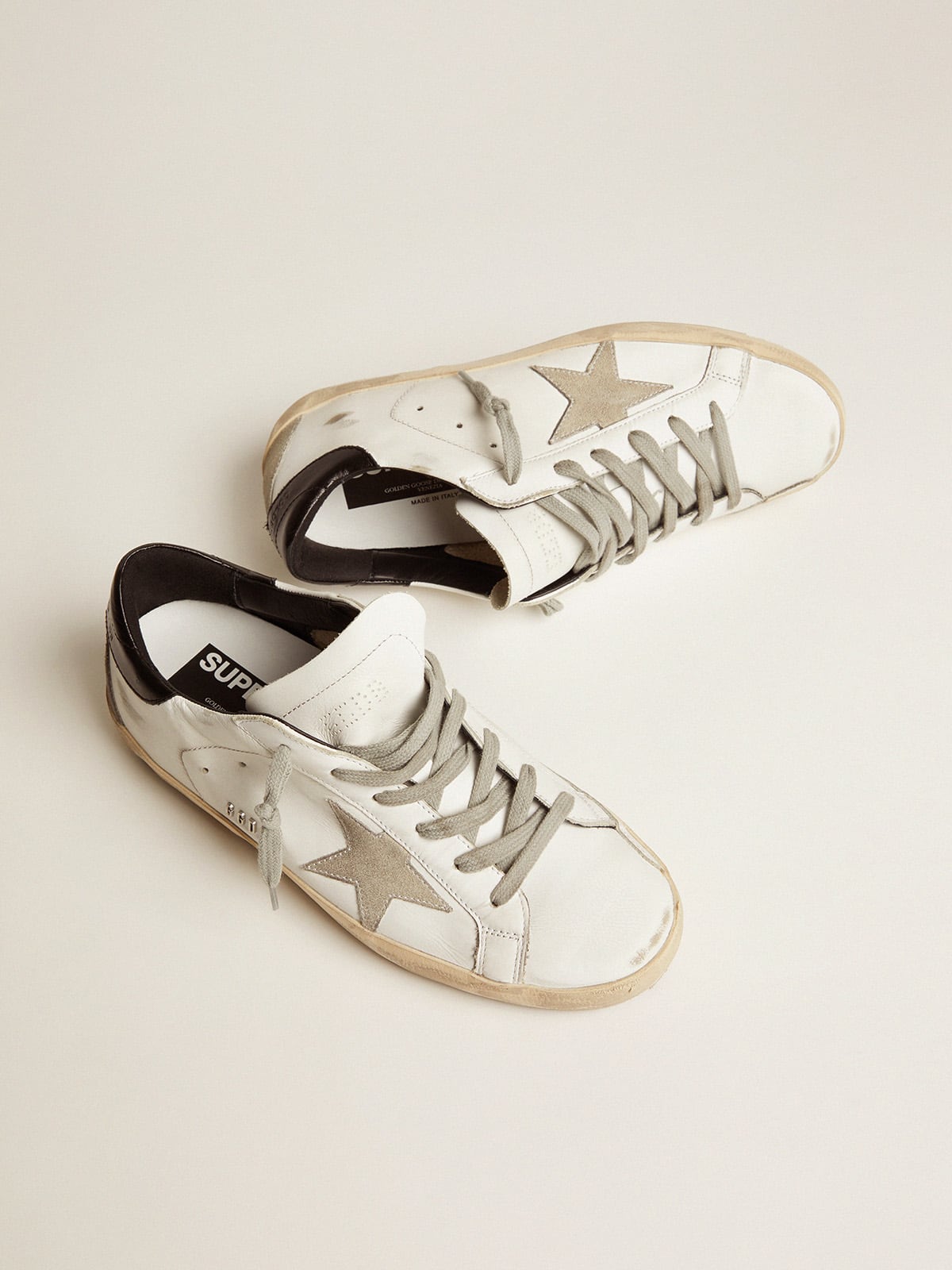 Women's Super-Star with black heel tab and metal stud lettering| Golden Goose