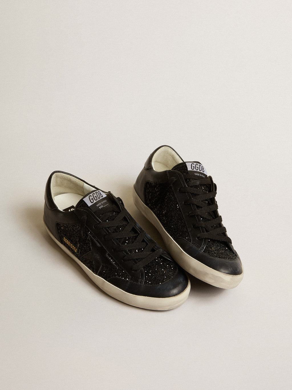 Super-Star in black nappa and glitter with glossy black leather star| Golden Goose