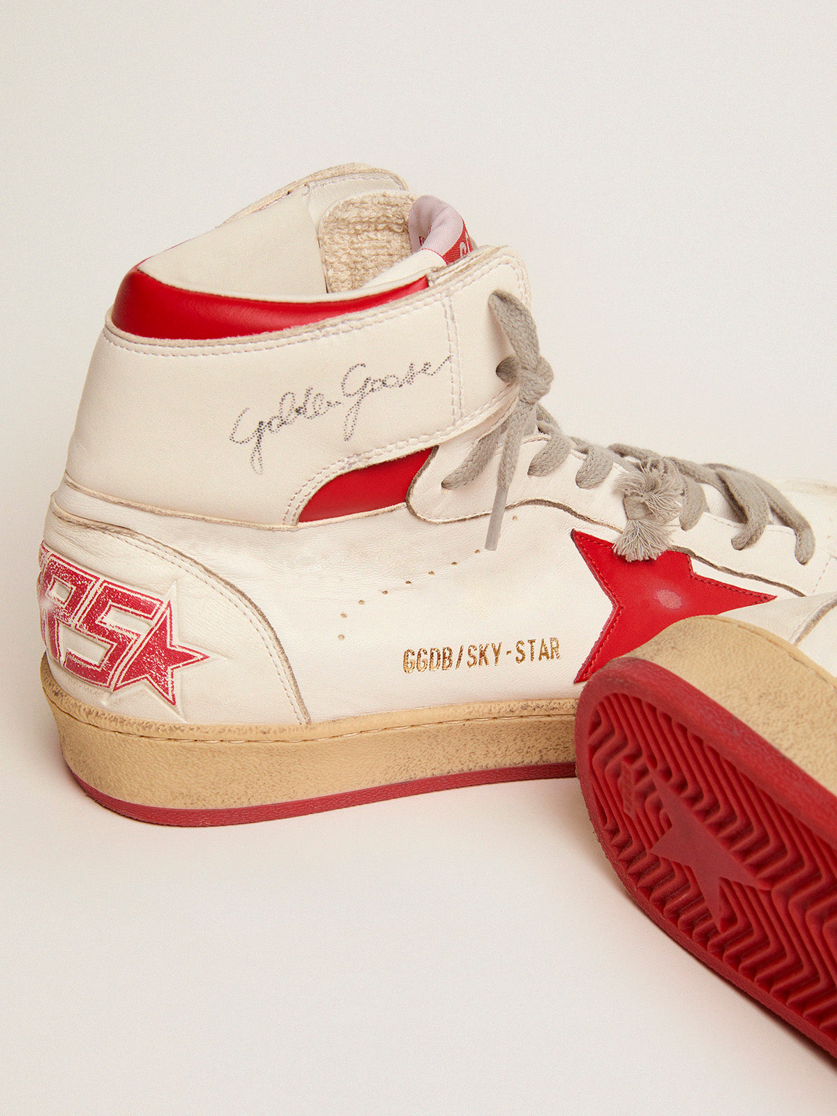Men's Sky-Star with signature on the ankle and red inserts| Golden Goose