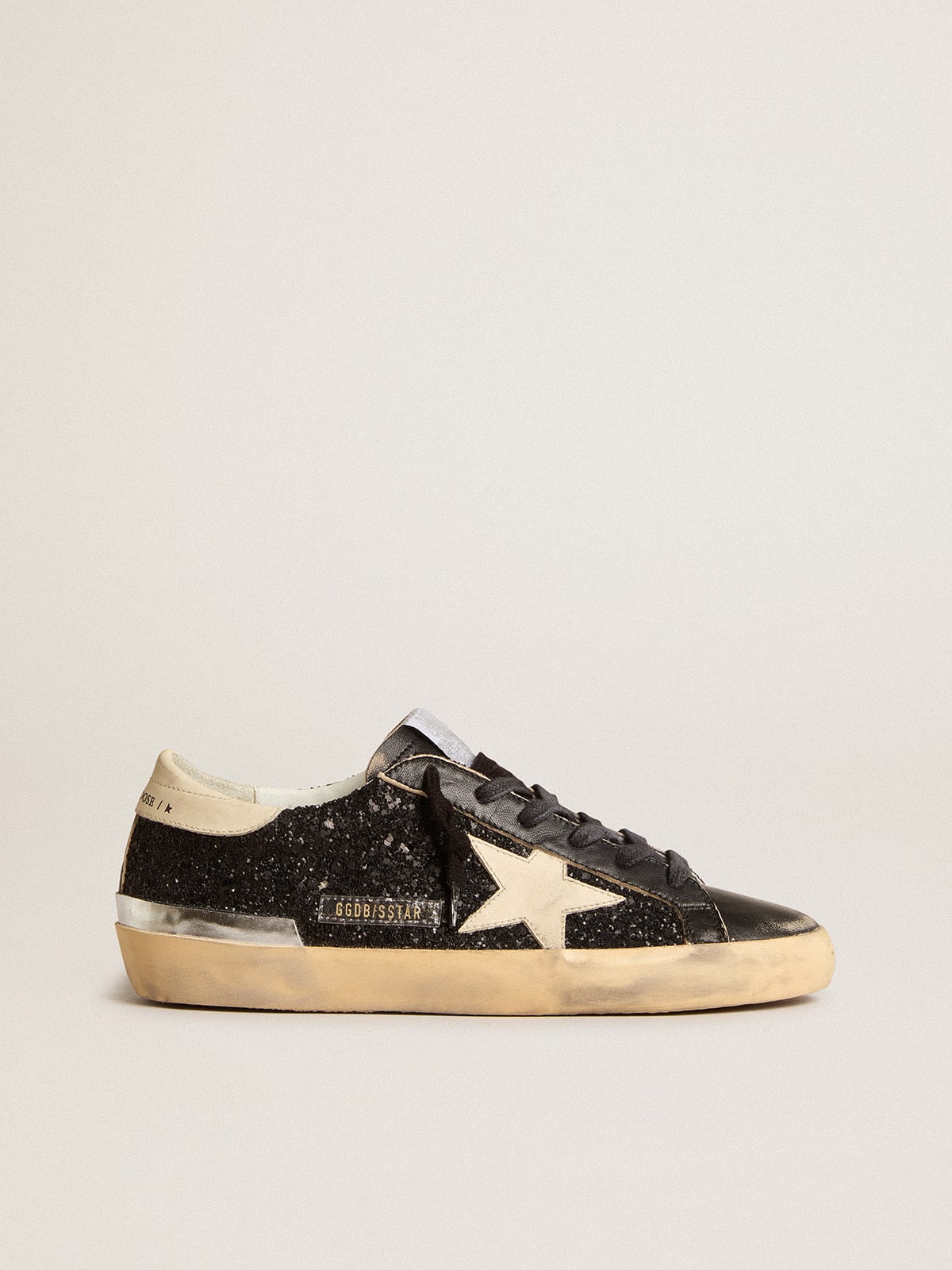 Super-Star in black glitter and nappa with cream leather star and heel tab| Golden Goose