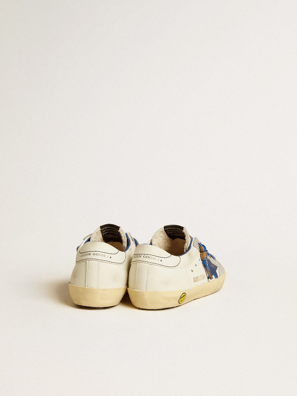 Super-Star Junior with blue leather star and ice-gray suede inserts| Golden Goose