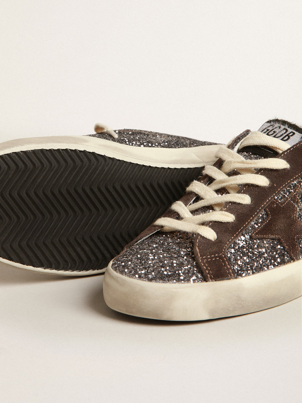 Super-Star in glitter with a brown star and lilac heel tab| Golden Goose
