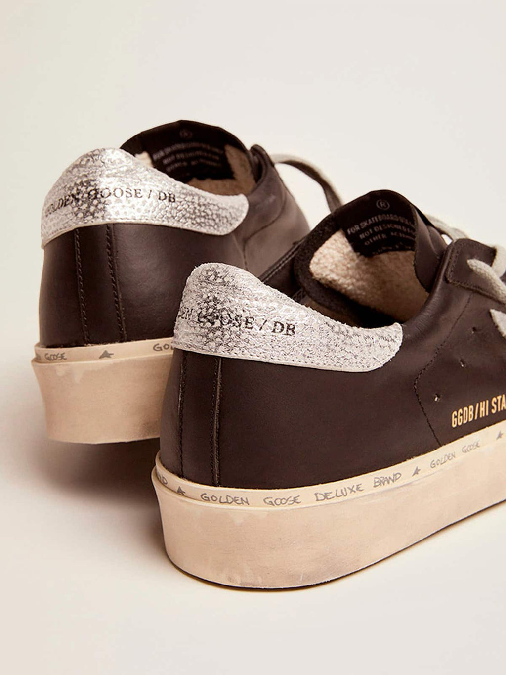 Women's Hi Star in black leather with silver laminated leather star| Golden Goose
