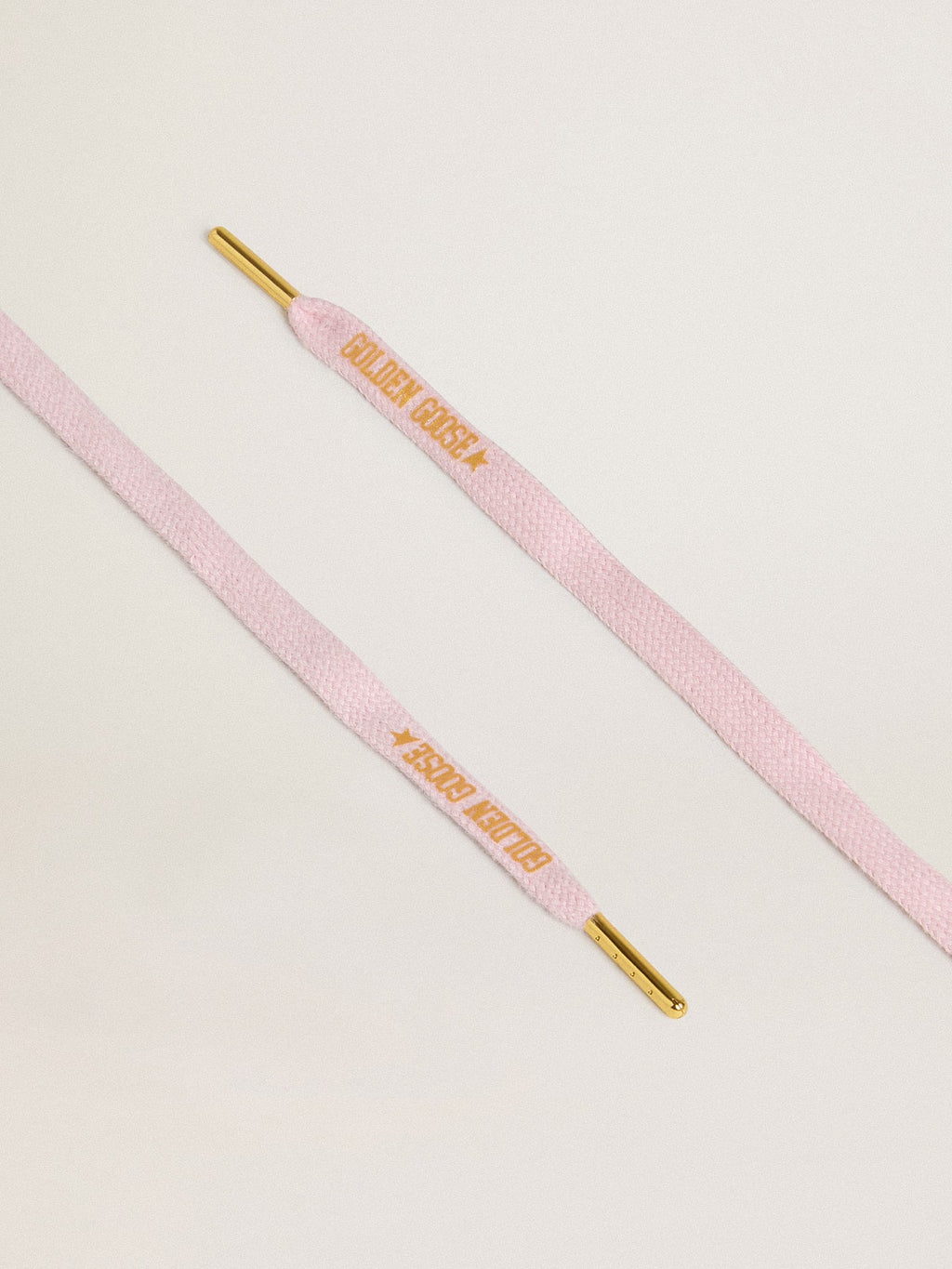 Pink cotton laces with contrasting gold-colored logo| Golden Goose