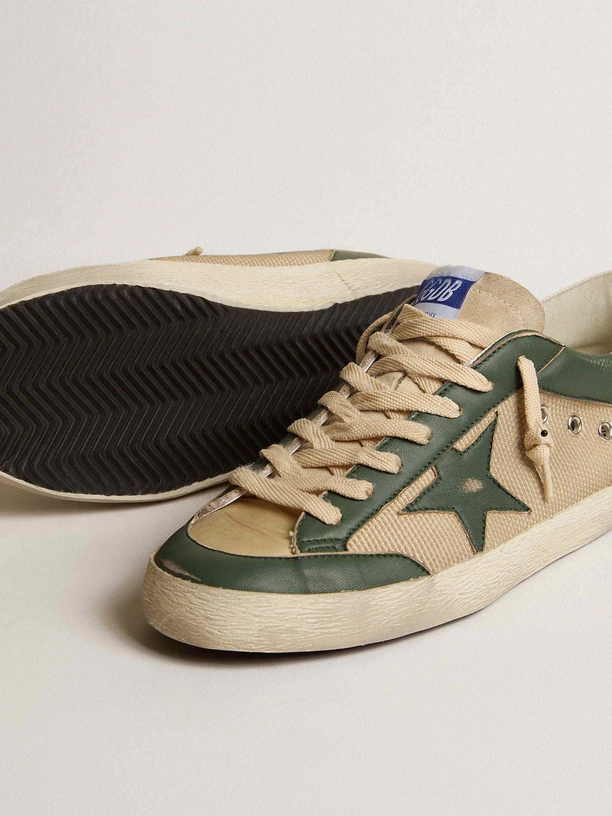 Super-Star LTD in cream mesh and green nappa with nappa star| Golden Goose