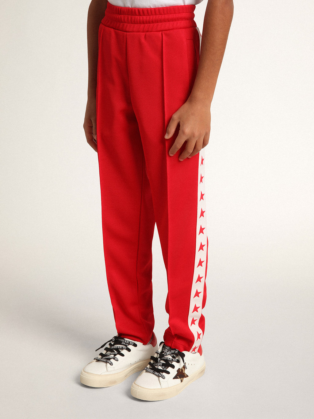 Red joggers with white stripe with contrasting red stars| Golden Goose