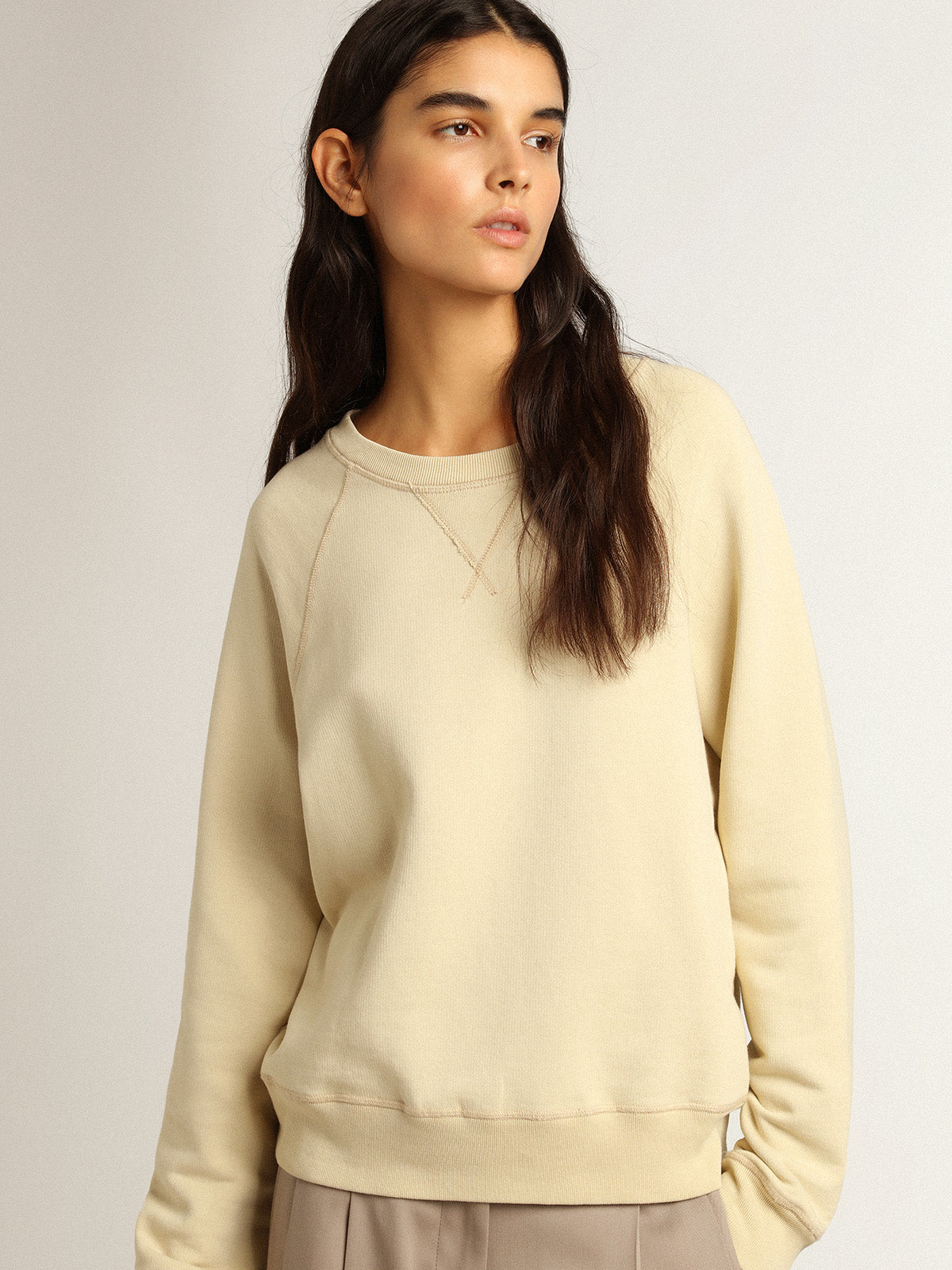 Marzipan-colored sweatshirt with lettering on the back| Golden Goose