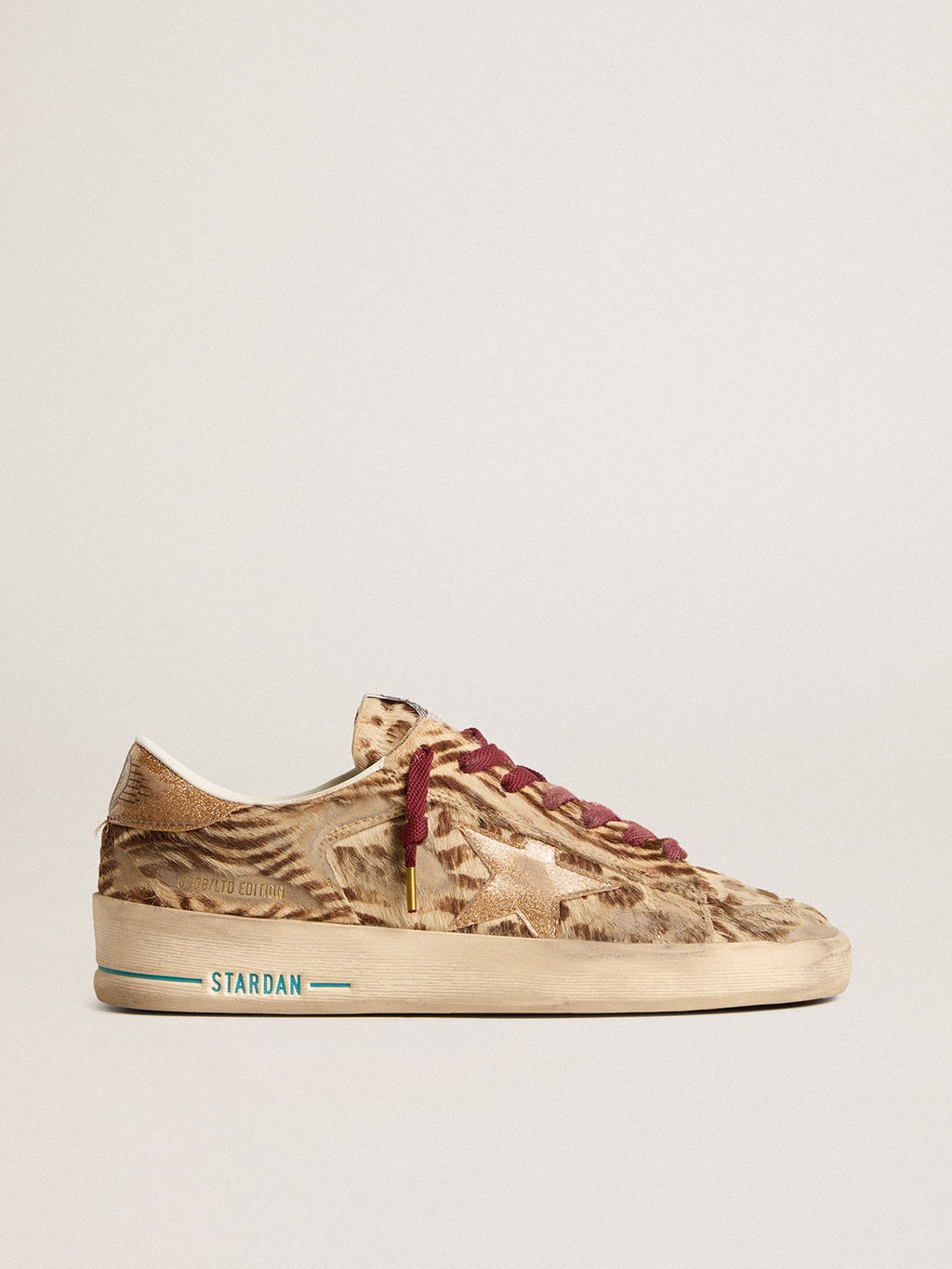 Women's Stardan LTD in animal-print pony skin with gold glitter star| Golden Goose