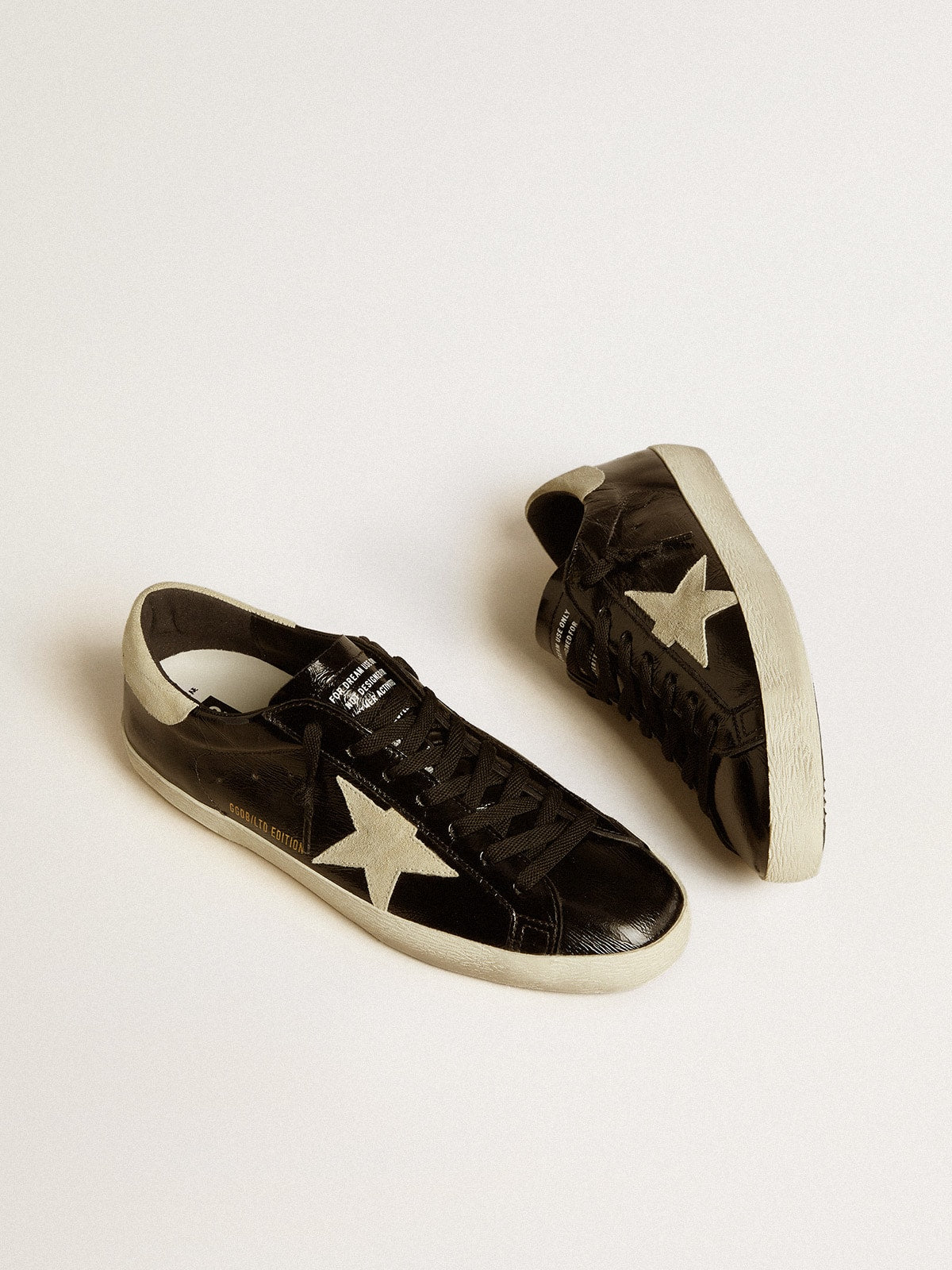 Men's Super-Star LTD in black patent leather with suede star and heel tab| Golden Goose