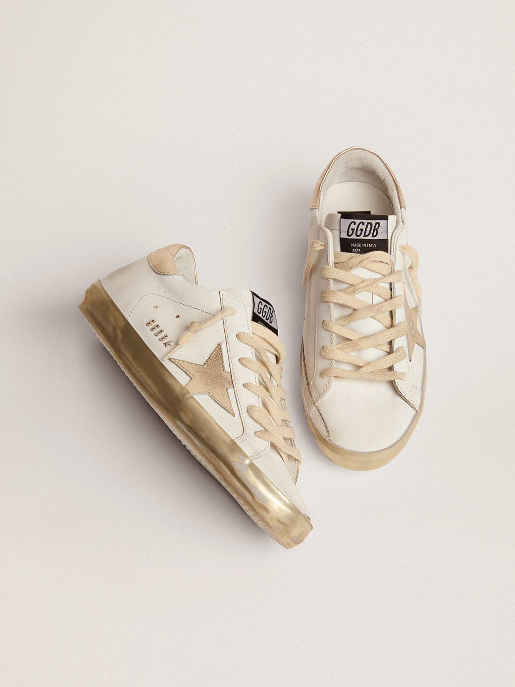 Women's Super-Star sneakers with gold foxing| Golden Goose