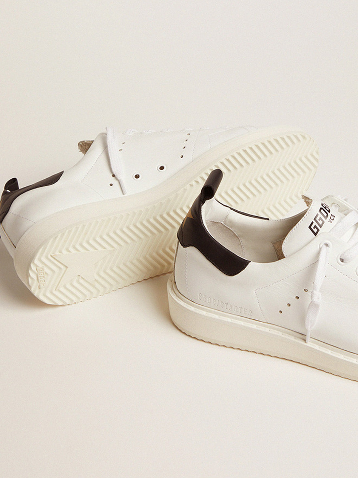 Starter sneakers in white leather with black leather heel tab| Golden Goose
