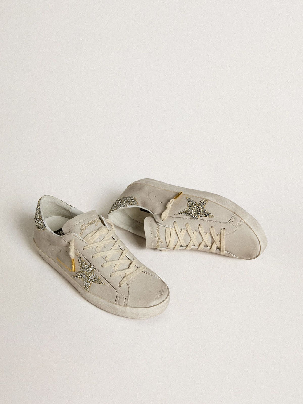 Women's Super-Star LTD in ivory nappa leather with platinum glitter star and heel tab| Golden Goose