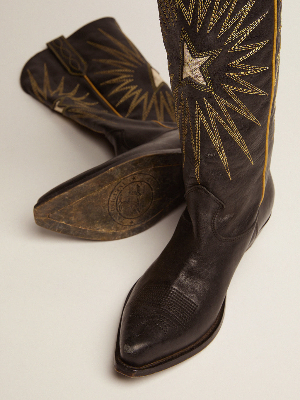 Women's boots in black leather with platinum star inlay| Golden Goose