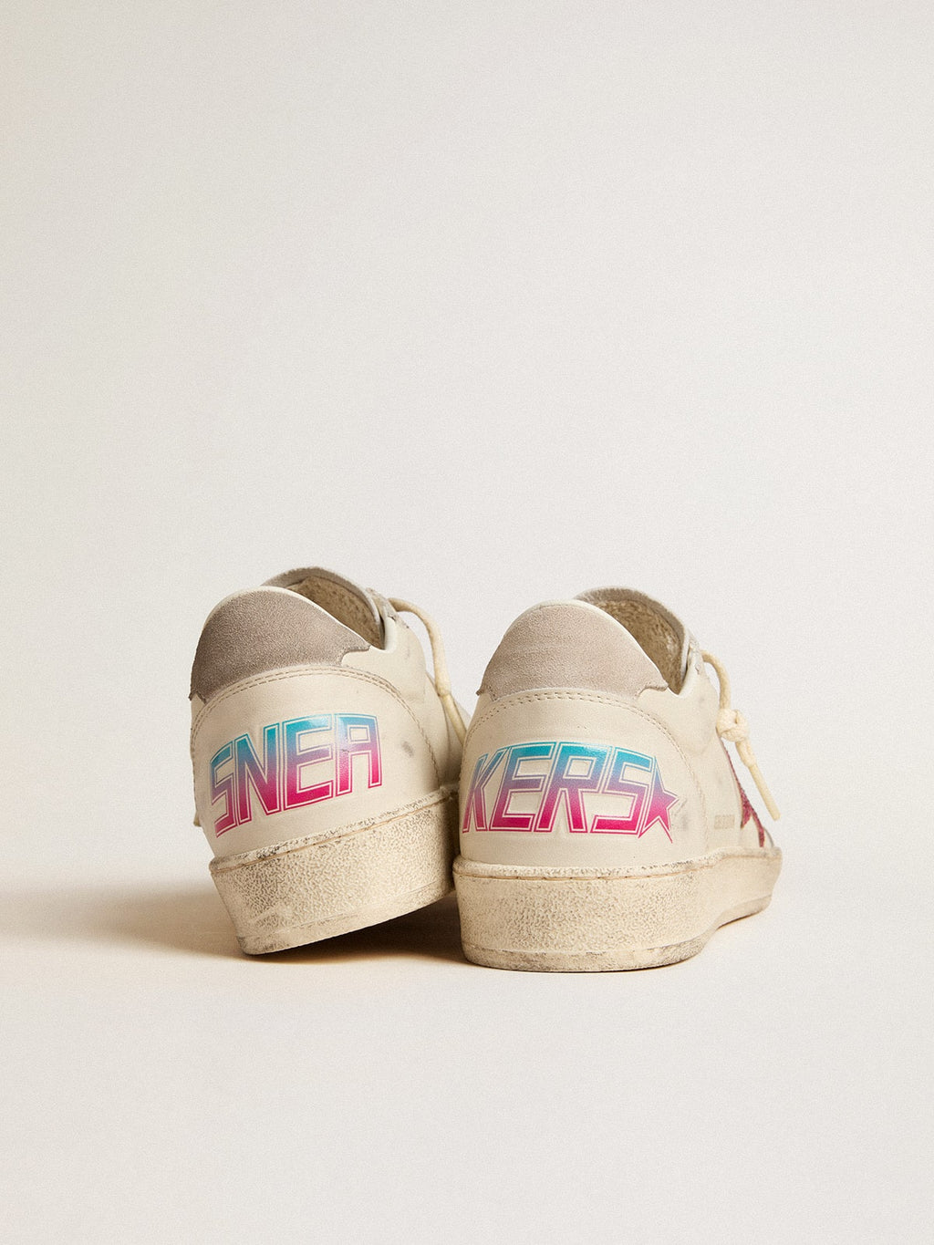 Ball Star LTD with fuchsia glitter star and light gray suede heel tab| Golden Goose