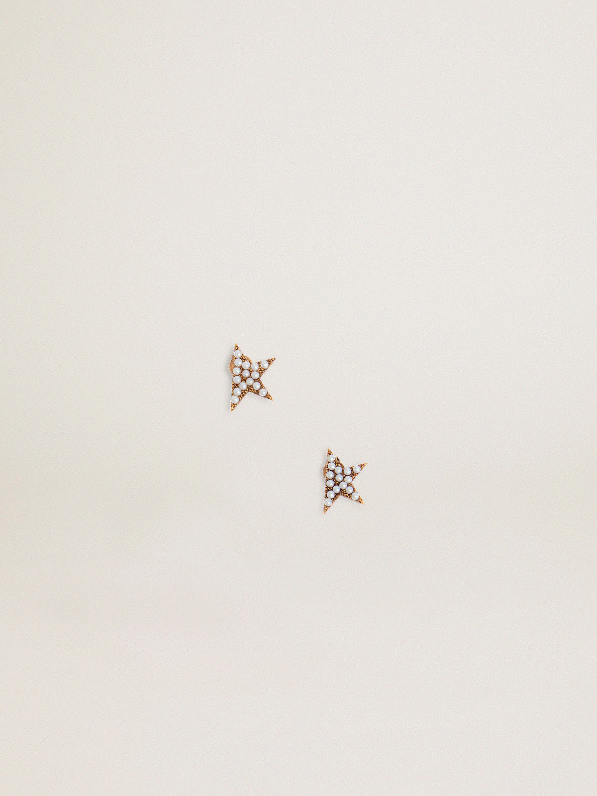 Women's stud earrings in antique gold color with decorative beads| Golden Goose