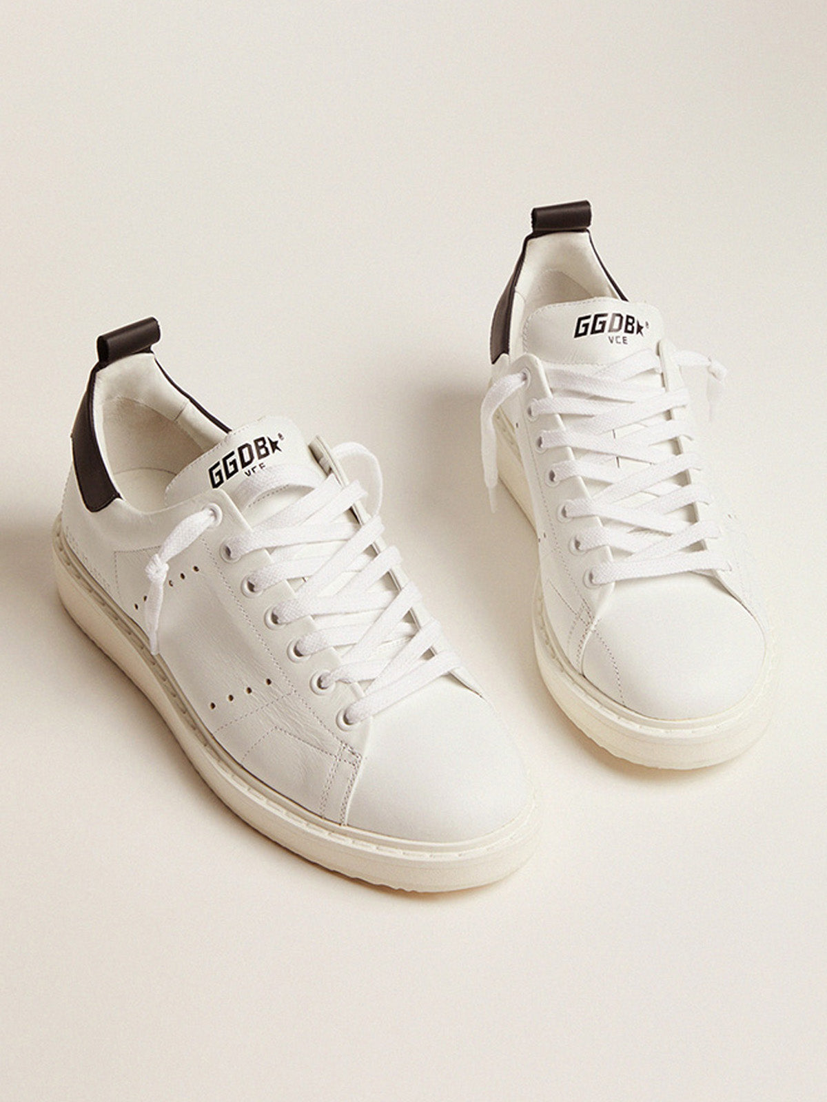 Starter sneakers in white leather with black leather heel tab| Golden Goose