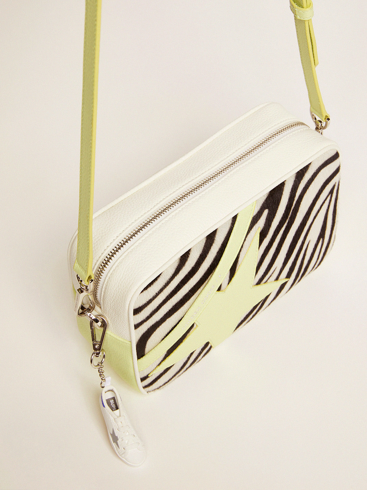 Star Bag in white and lime hammered leather with zebra-print pony skin insert and lime-colored leather star| Golden Goose