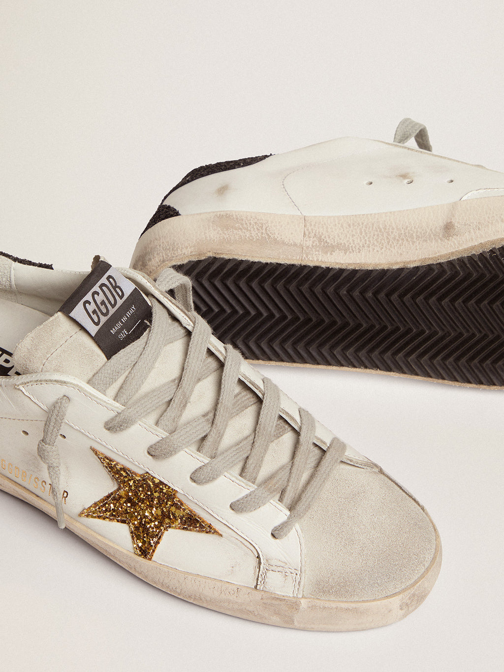Women's Super-Star with gold star and black glitter heel tab| Golden Goose