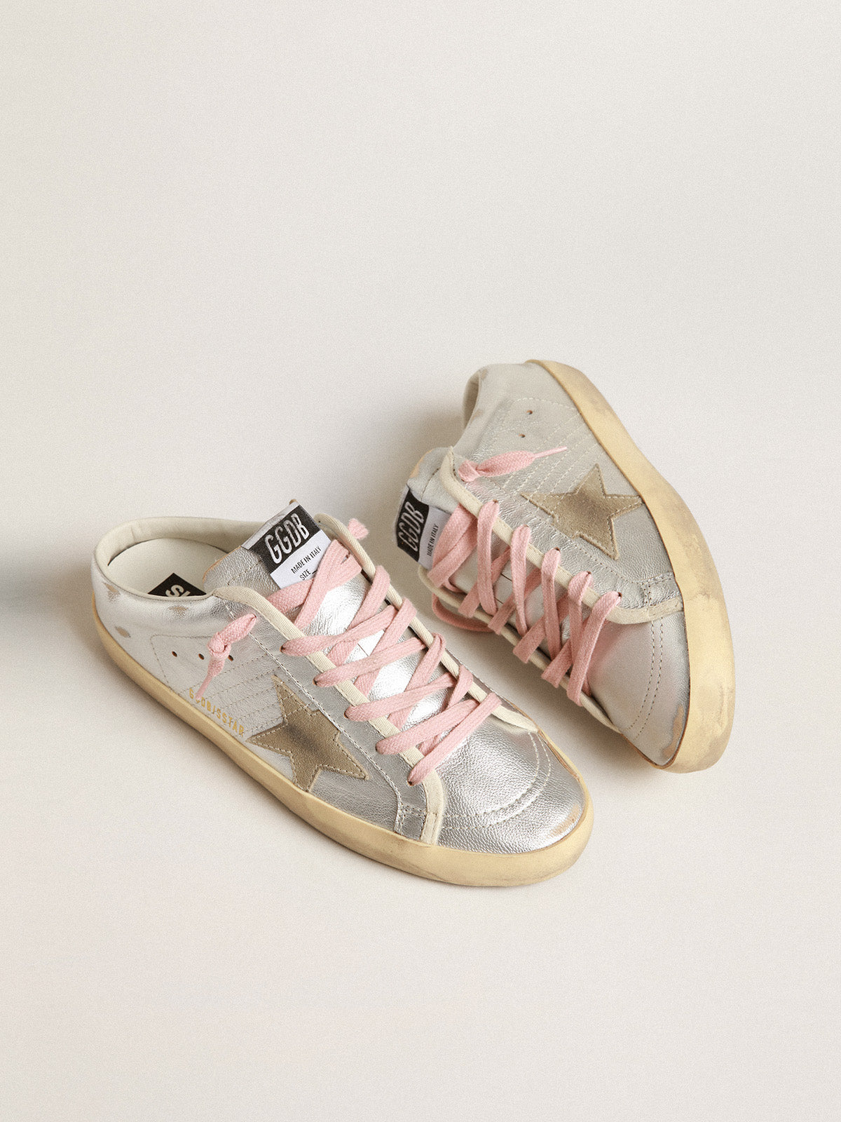 Super-Star Sabots in silver metallic leather with suede star| Golden Goose