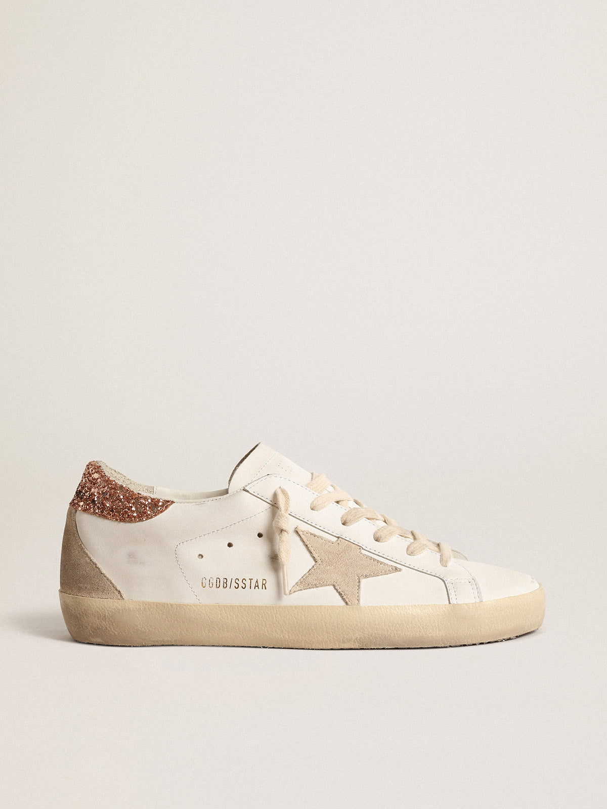 Super-Star with a suede star and peach-pink glitter heel tab| Golden Goose