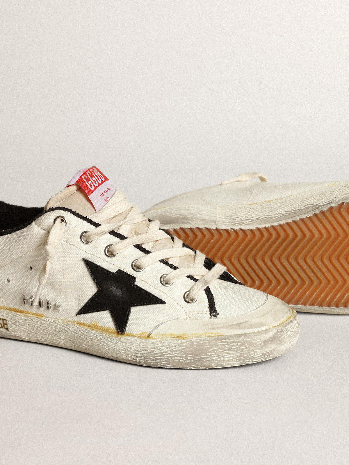 Men's Super-Star LTD in beige canvas with black star| Golden Goose