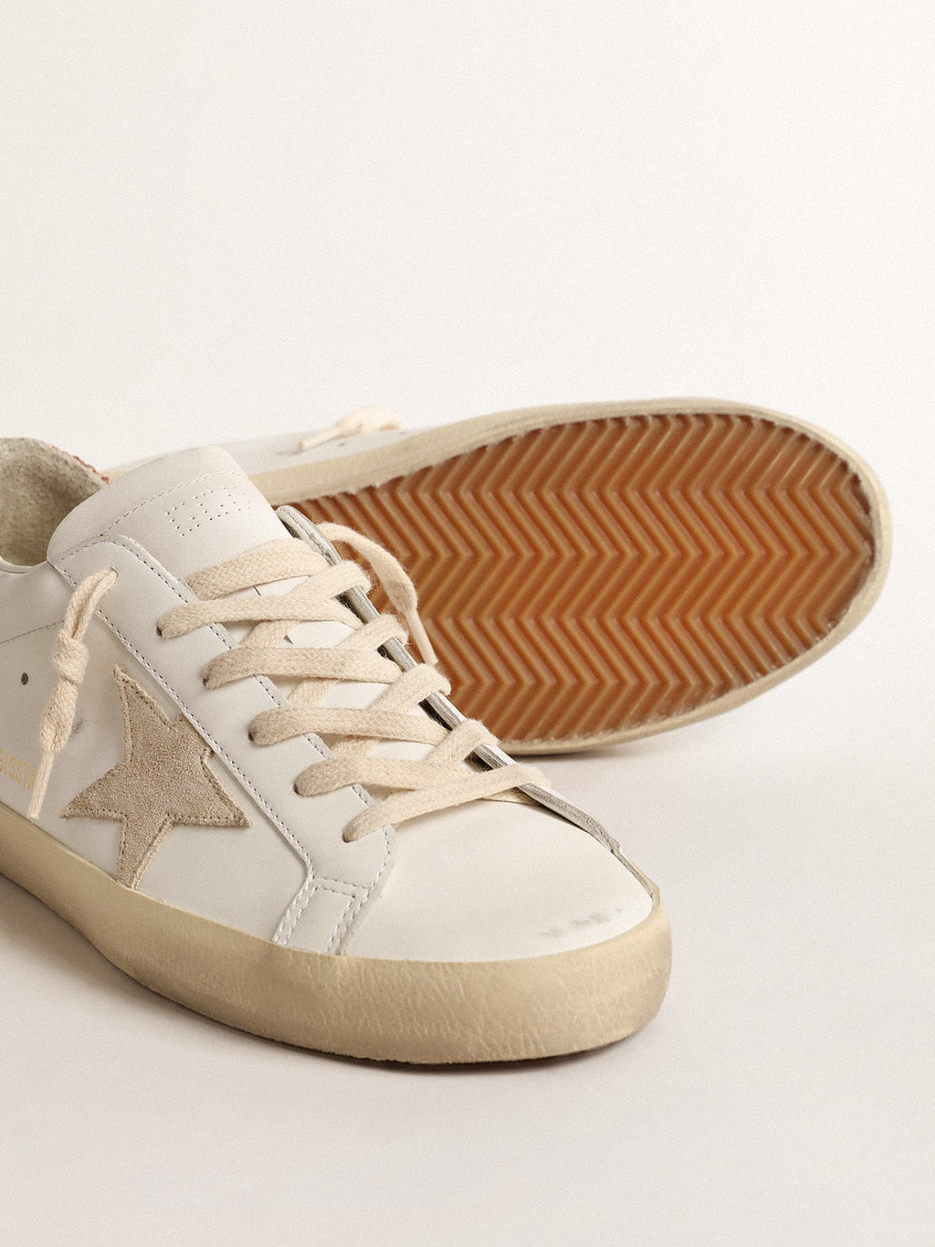 Women's Super-Star with a suede star and peach-pink glitter heel tab| Golden Goose