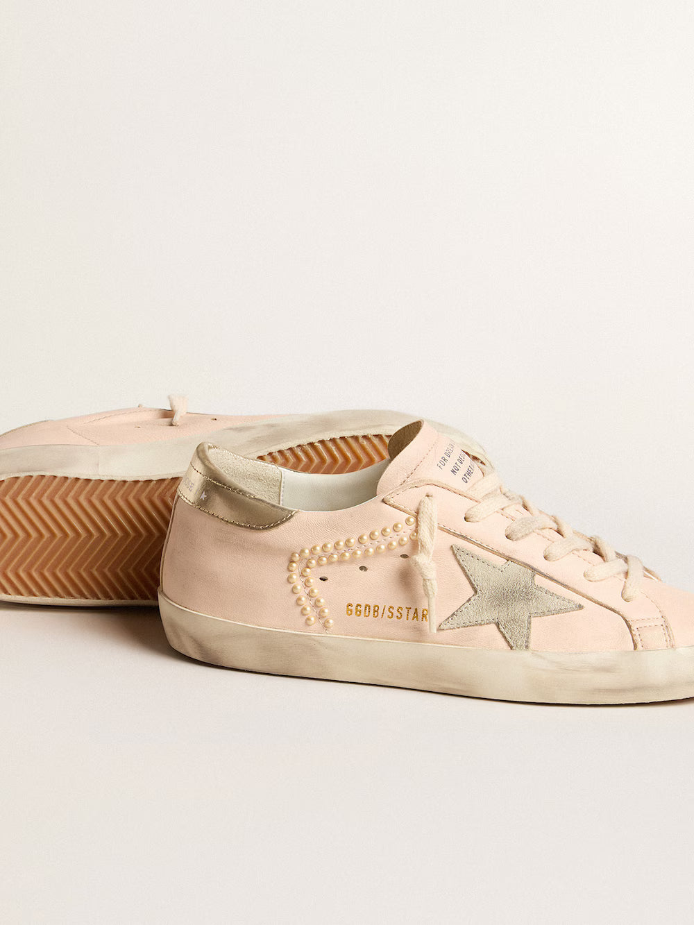 Super-Star in pink nappa with ice-gray star and platinum heel tab| Golden Goose