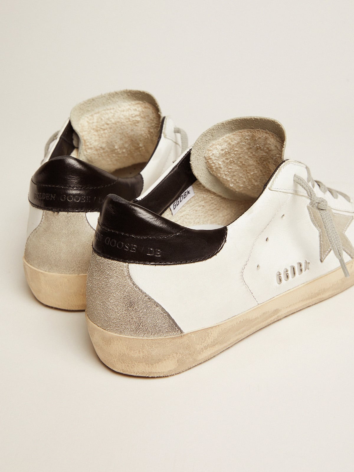 Women's Super-Star with black heel tab and metal stud lettering| Golden Goose