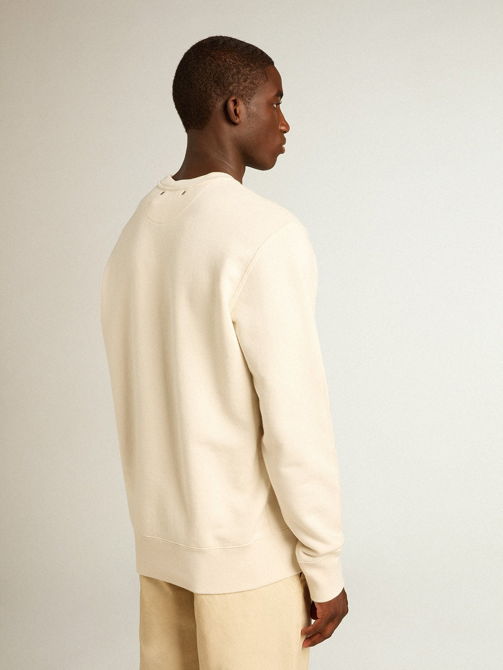 Men's aged white cotton sweatshirt with embroidery on the front