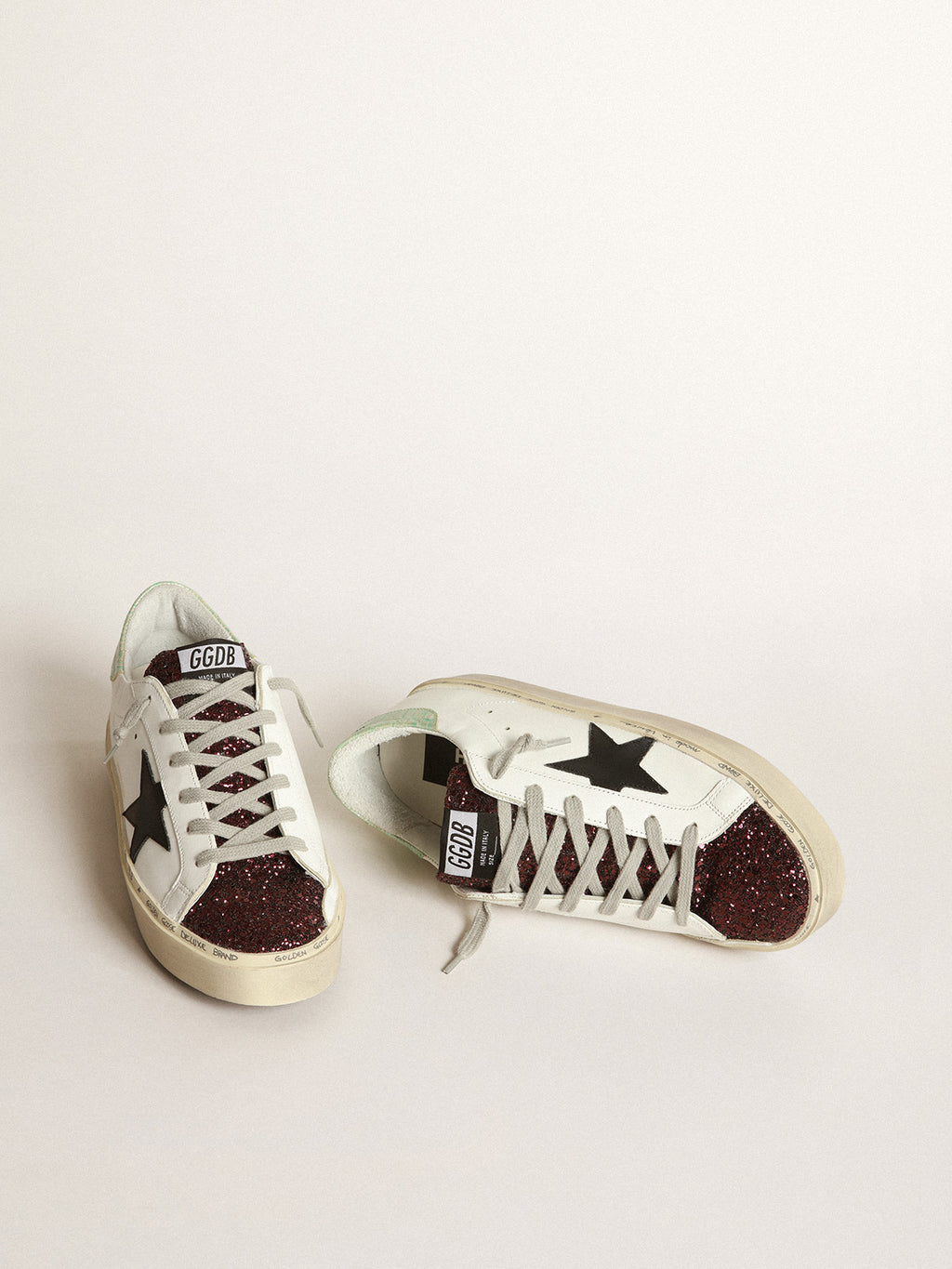 White Hi-Star sneakers with glittery insert and black star| Golden Goose