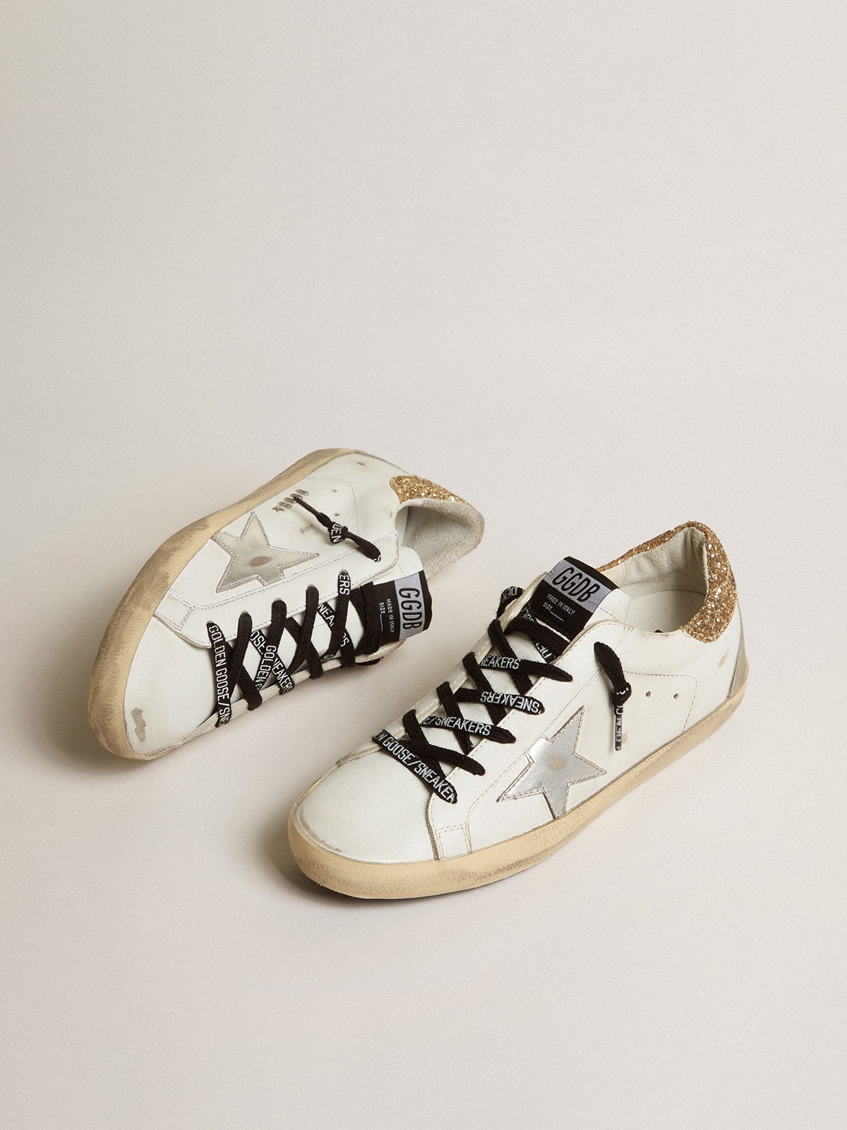 Women's white leather Super-Star sneakers with glittery heel tab| Golden Goose