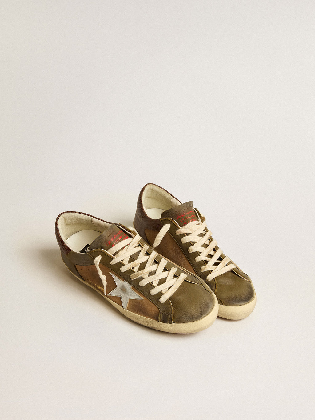 Super-Star LTD in green leather and tobacco-colored suede with silver star| Golden Goose